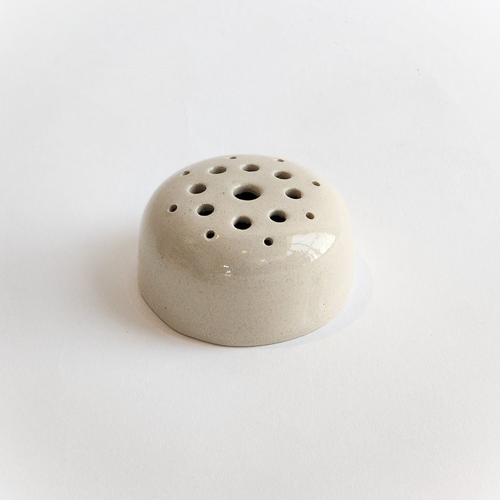 Handmade white ceramic flower frog dome