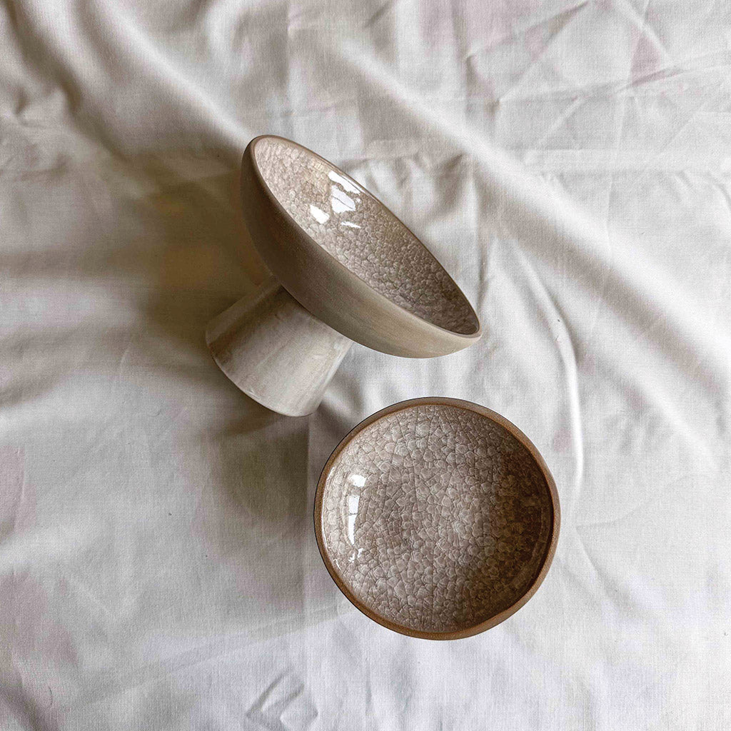 Gray snowflake pedestal bowls, small and large