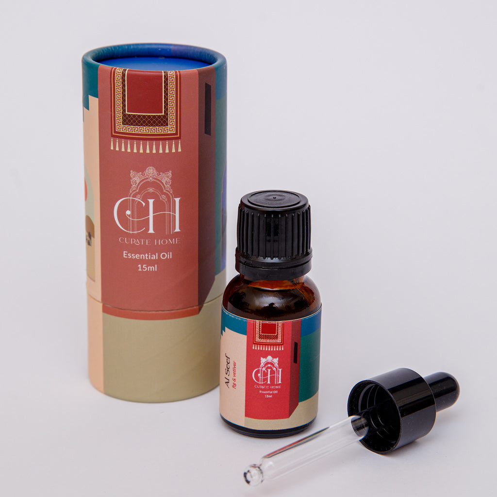 A bottle of Curate Home brand essential oil diffuser, with a dropper, with packaging box - Al Seef