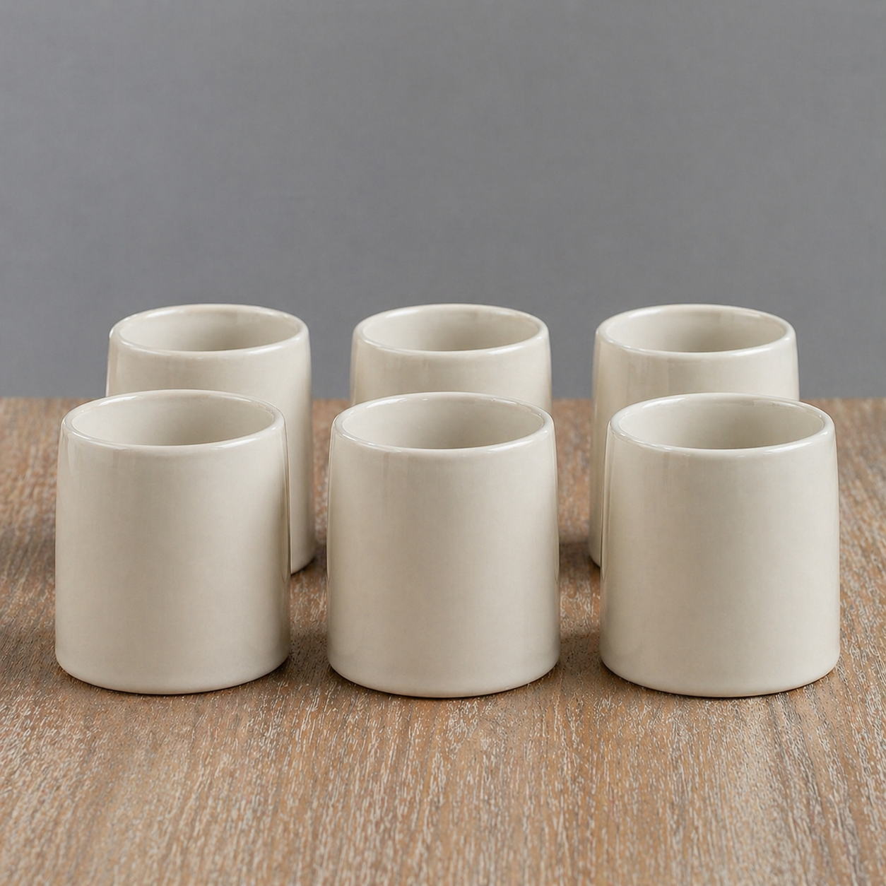 Set of six beige ceramic cups/glasses