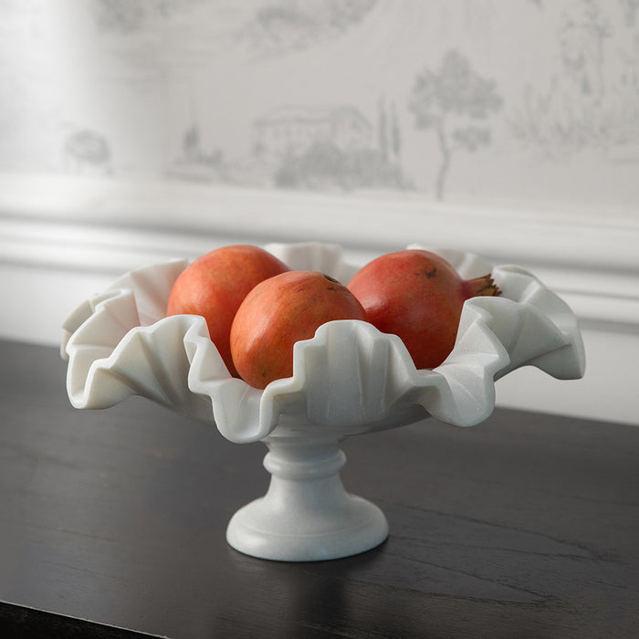 Safa handcrafted white marble pedestal fruit bowl styled on a table