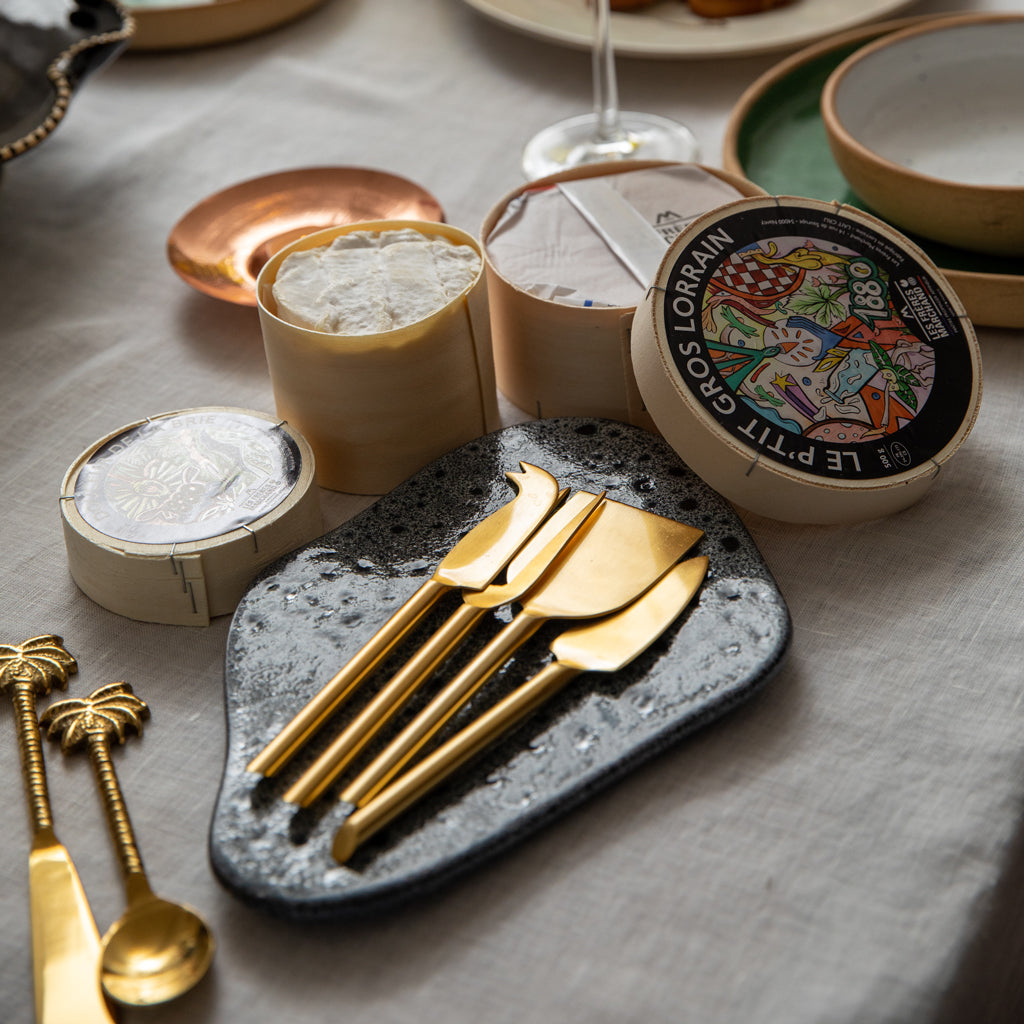 This set of 4 cheese knife set is made in stainless steel with a matte Brass finish, comes with a gift box.